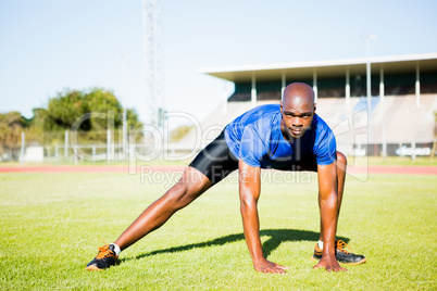 Athlete warming up in a stadium