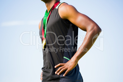 Athlete with gold medals around his neck