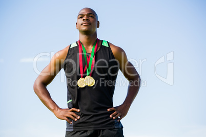 Athlete with gold medals around his neck