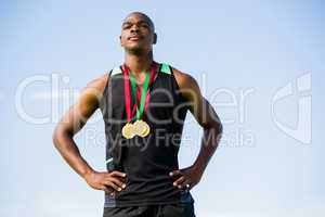 Athlete with gold medals around his neck