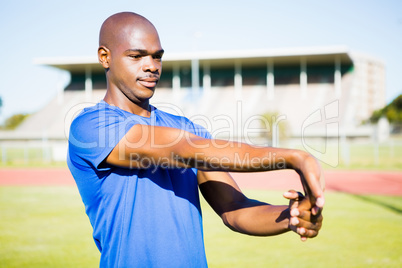 Athlete warming up in a stadium