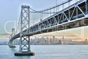 Sunset over Oakland-San Francisco Bay Bridge and San Francisco Skyline, California