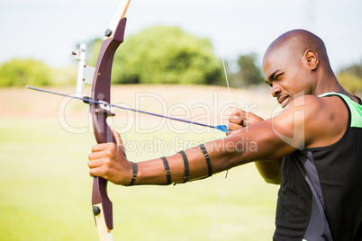Athlete practicing archery