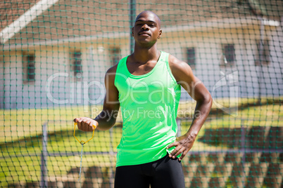 Portrait of athlete holding hammer throw