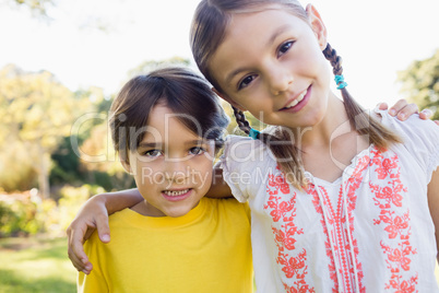 Portrait of brother and sister posing for the camera