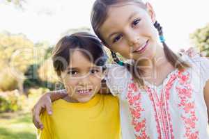 Portrait of brother and sister posing for the camera