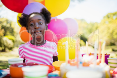 Portrait of cute girl posing during a birthday party