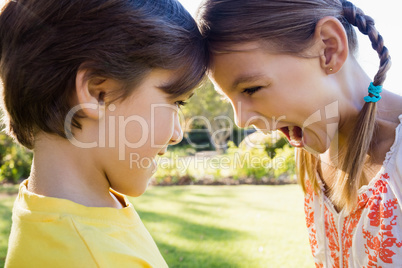 Close up of brother and sister having fun