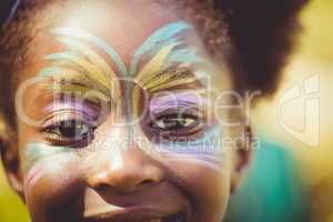 Close-up of the eyes of a little girl with make up