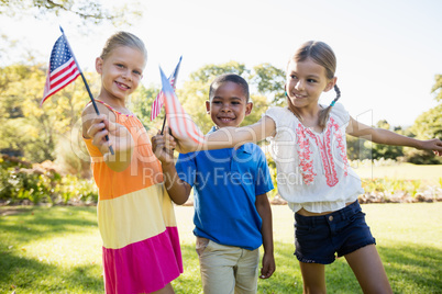 Happy children showing usa flag