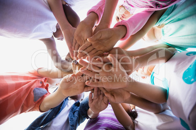 Focus on kids hands during a sunny day at camera