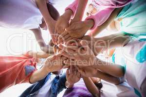 Focus on kids hands during a sunny day at camera