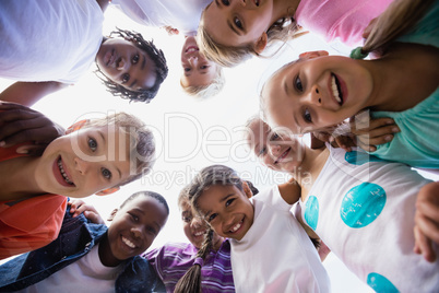 Kids posing together during a sunny day at camera