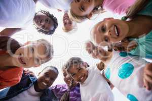 Kids posing together during a sunny day at camera