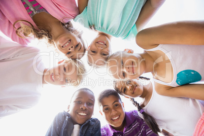 Kids posing together during a sunny day at camera