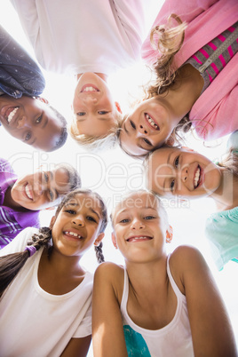 Kids posing together during a sunny day at camera