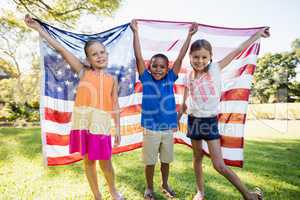 Happy children showing usa flag
