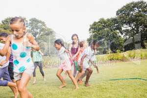 Kids playing together during a sunny day