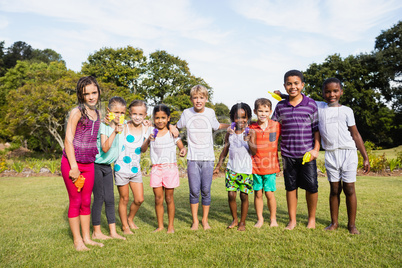 Kids posing together during a sunny day