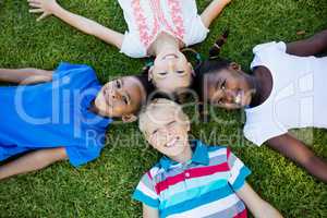 Kids posing together during a sunny day at camera