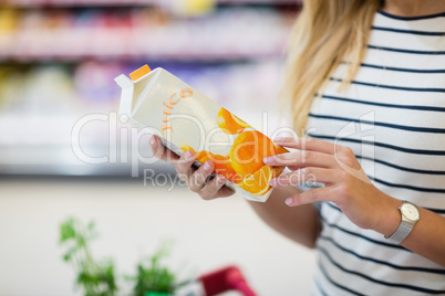 Bottle of orange juice in a supermarket