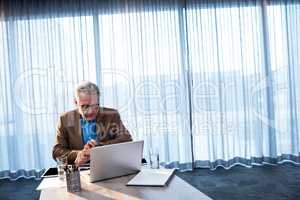 Businessman watching his watch