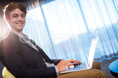 Young businessman  smiling
