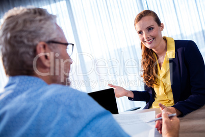 Two businessmen interacting