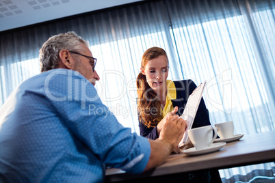 Two businessmen interacting