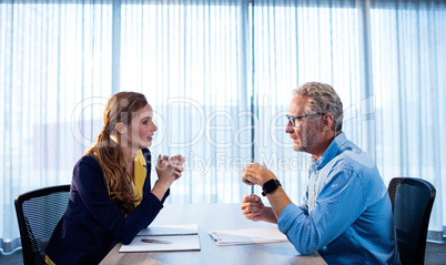 Two businessmen interacting