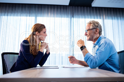 Two businessmen interacting
