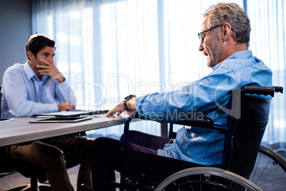 Two businessmen interacting