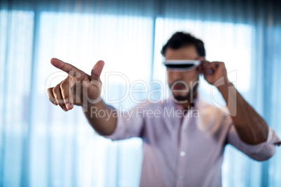 Businessman using an oculus