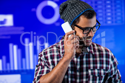 Hipster man calling with smartphone