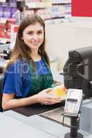 Portrait of woman cashier smiling