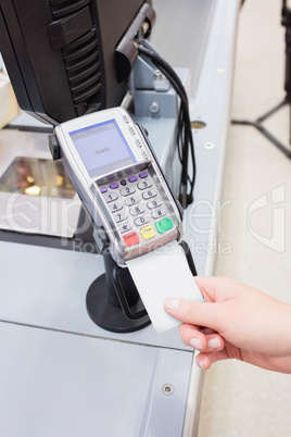 Close up of payment by credit card
