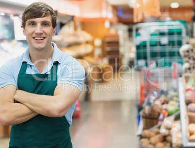 Portrait of man grocer smiling