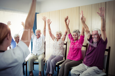 Seniors doing exercises