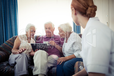 Seniors using a tablet computer