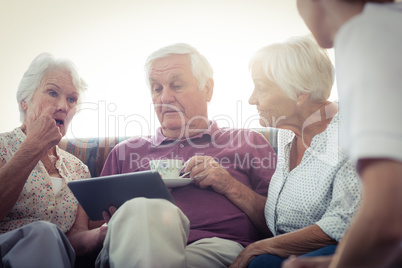 Seniors using a tablet computer