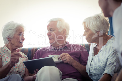 Seniors using a tablet computer