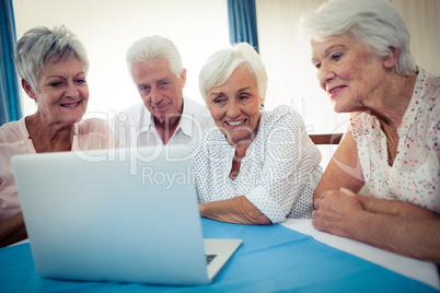 Group of seniors using a computer