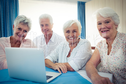 Group of seniors using a computer