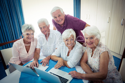 Group of seniors using a computer