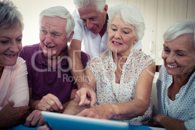 Group of seniors using a computer