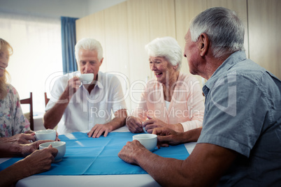 Group of seniors drinking coffee