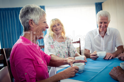 Group of seniors drinking coffee