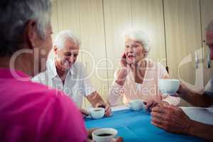 Group of seniors drinking coffee