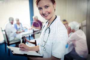 Portrait of a nurse with clipboard