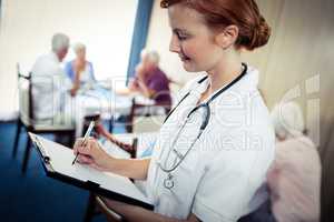 Portrait of a nurse with clipboard